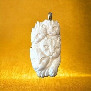 NOVICA carved bone cat pendant with silver finding, no chain,excellent condition